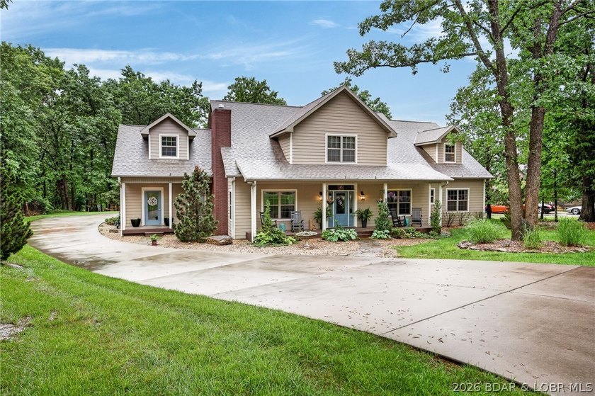 Set on a beautifully landscaped, nearly one-acre lot in The - photo 4