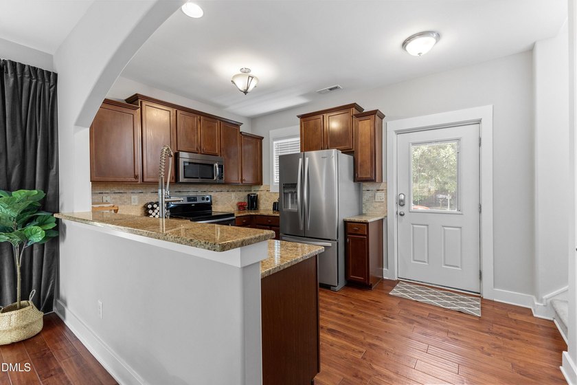 Welcome home to this beautiful, move-in-ready end-unit townhouse - photo 11