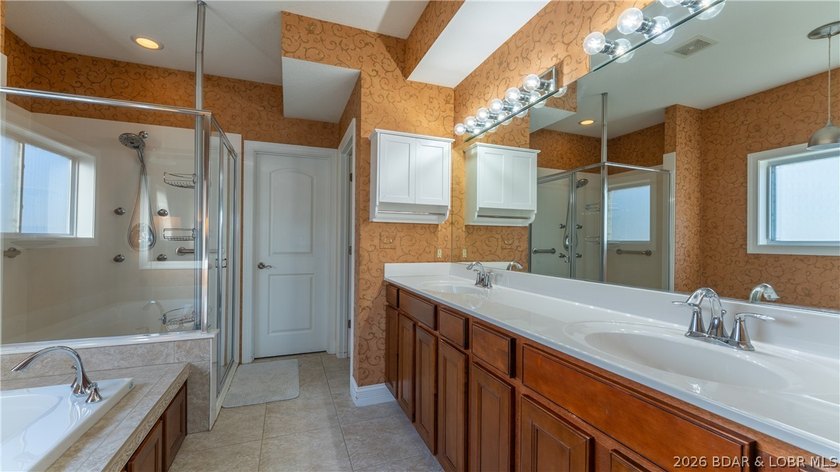Enjoy panoramic lake views and outstanding value in this - photo 14