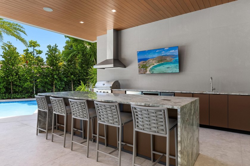 Located at 217 Thatch Palm Drive within the prestigious Royal - photo 49