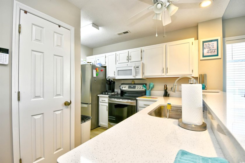 Fabulous End-Unit in Gated Waterway Community! Views for Miles &amp; - photo 11