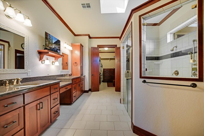 Set beyond a private gated entrance atop 3.2 acres spanning two - photo 22