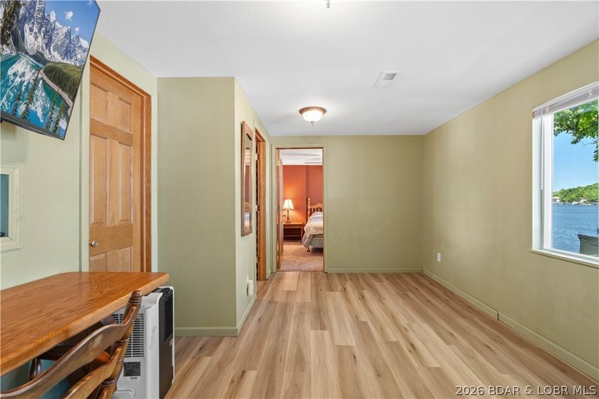 Tucked away on the sought-after Little Niangua Arm, this 3 bed - photo 9
