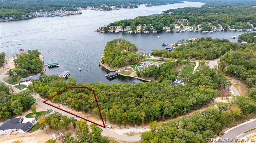 Offering almost 5 acres and 220' of shoreline, this double lot - photo 6