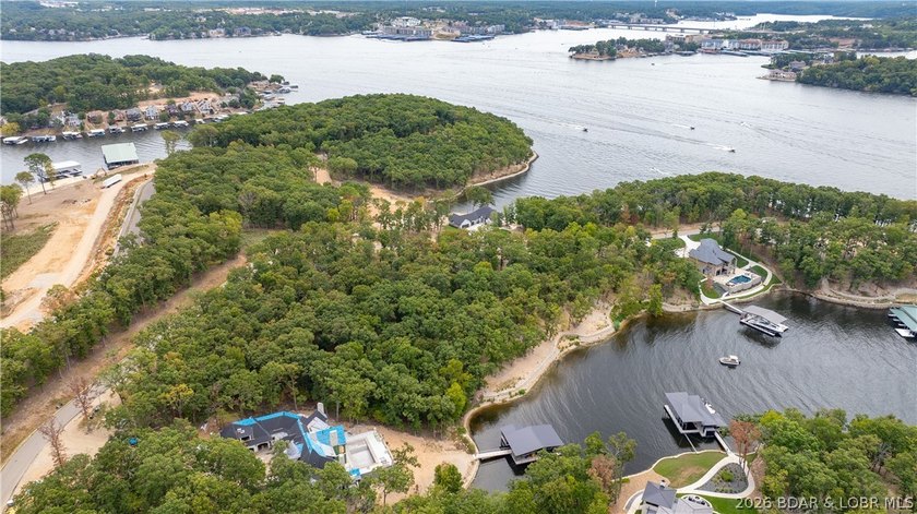 Offering almost 5 acres and 220' of shoreline, this double lot - photo 9
