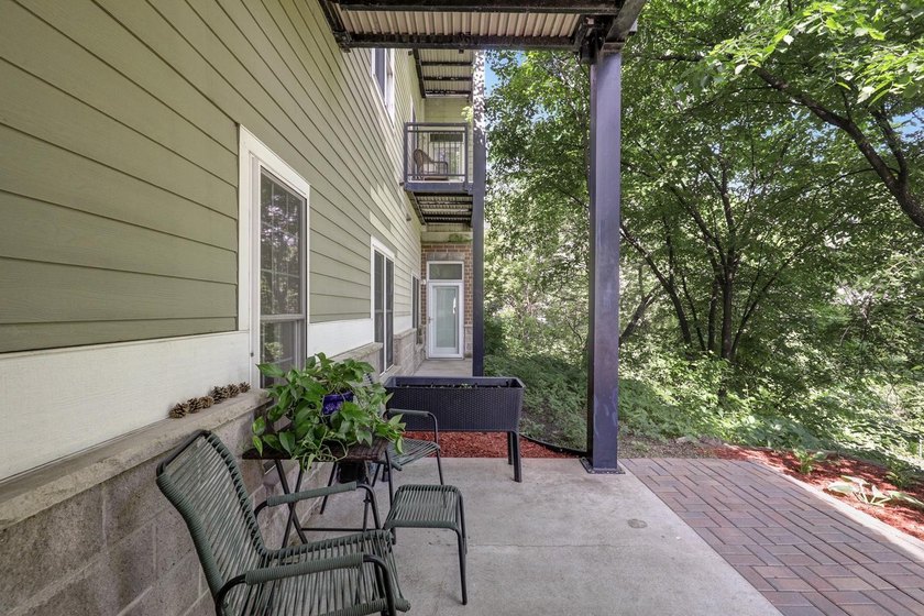 Welcome home to Unit 101 at Greenway Terrace Condominiums, where - photo 4