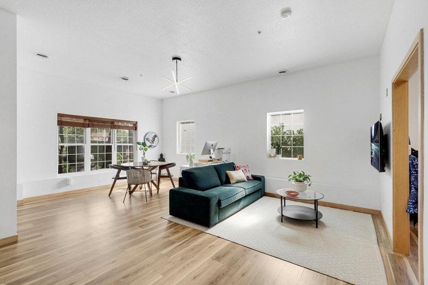 Welcome home to Unit 101 at Greenway Terrace Condominiums, where - photo 8