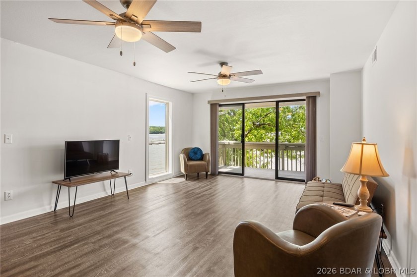 Enjoy the lake lifestyle at Pelican Bay Condominiums. This - photo 2