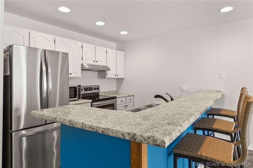 Enjoy the lake lifestyle at Pelican Bay Condominiums. This - photo 5