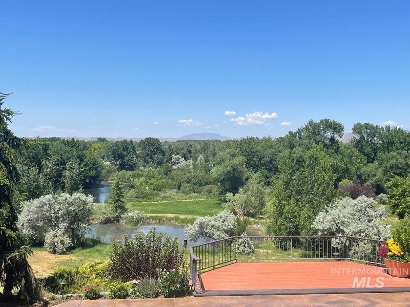 Nestled on a sprawling 4.5-acre estate, this breathtaking - photo 5