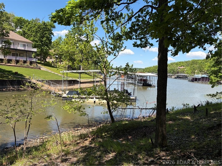 Discover the perfect setting for your dream lake home in the - photo 7