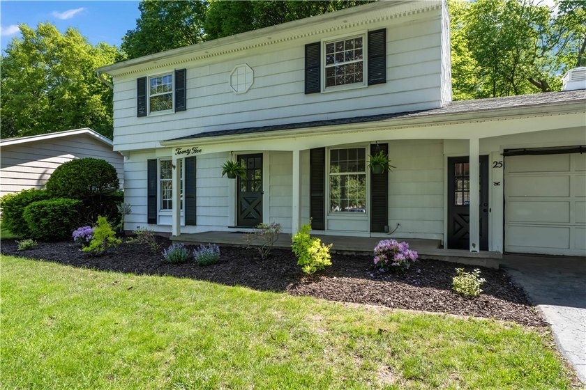 Beautifully updated 4-bedroom, 1.5-bath Colonial nestled on a - photo 4