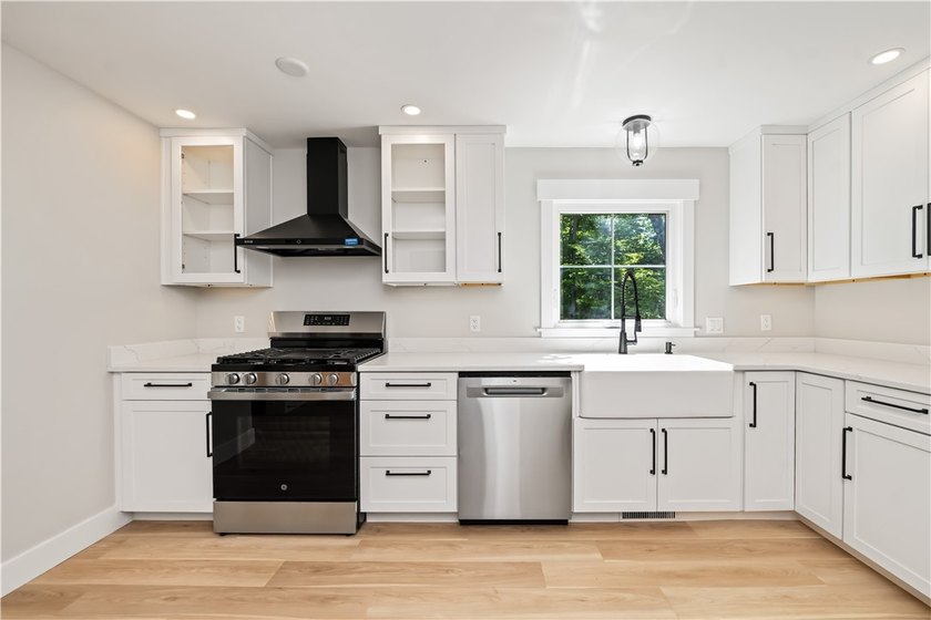 Beautifully updated 4-bedroom, 1.5-bath Colonial nestled on a - photo 9