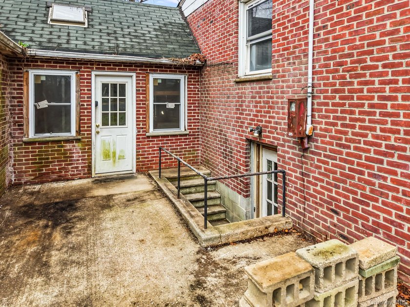 This spacious corner property nestled on a estimated half-acre - photo 7