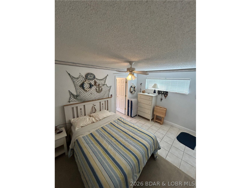 Enjoy Lake of the Ozarks living in this well-maintained 1 bed, 1 - photo 7