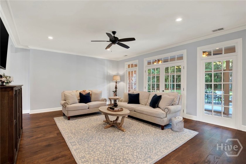Nestled beneath majestic live oaks on a picturesque 1.9-acre - photo 11