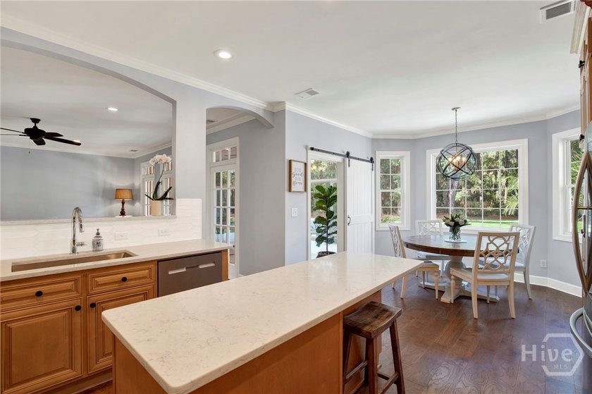 Nestled beneath majestic live oaks on a picturesque 1.9-acre - photo 16