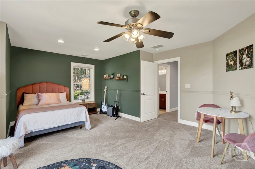 Nestled beneath majestic live oaks on a picturesque 1.9-acre - photo 23