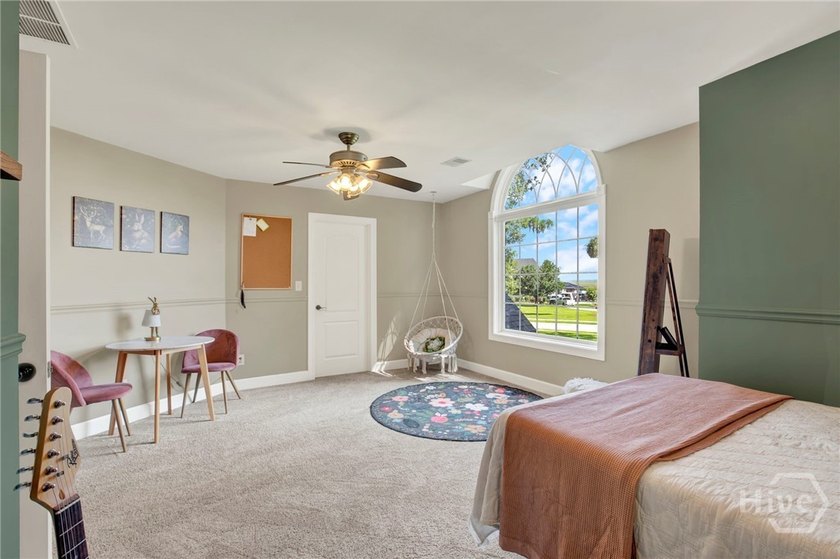 Nestled beneath majestic live oaks on a picturesque 1.9-acre - photo 24