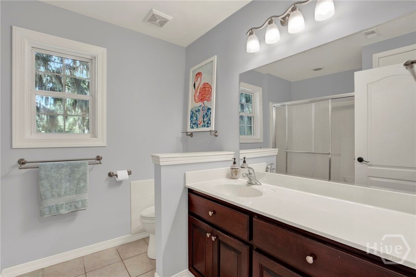 Nestled beneath majestic live oaks on a picturesque 1.9-acre - photo 25