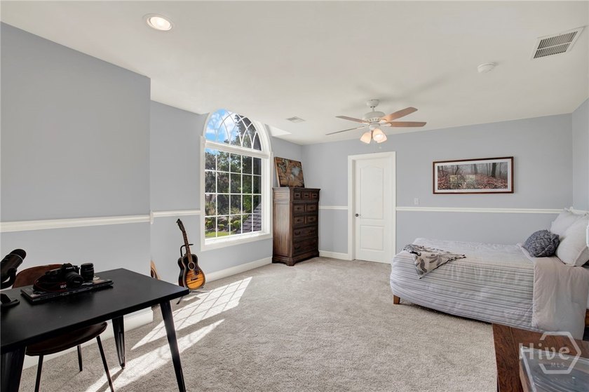 Nestled beneath majestic live oaks on a picturesque 1.9-acre - photo 28