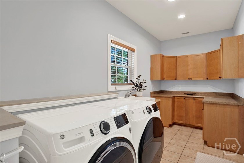 Nestled beneath majestic live oaks on a picturesque 1.9-acre - photo 35
