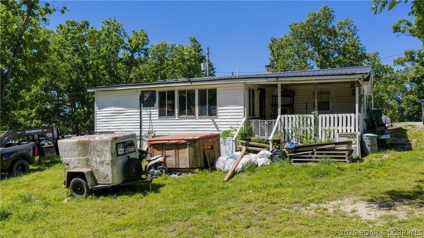 Tucked near the water in Warsaw, this 3-bedroom, 1-bath ranch - photo 3