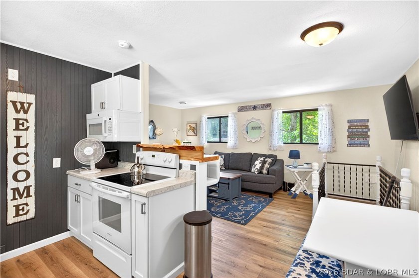 Tucked along a quiet cove at the 3 MM, 131 Walnut Drive is the - photo 5