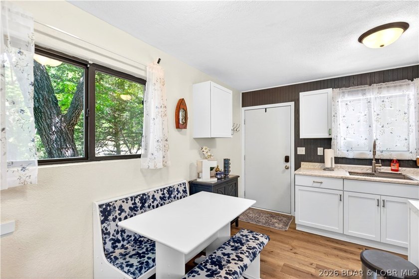 Tucked along a quiet cove at the 3 MM, 131 Walnut Drive is the - photo 6