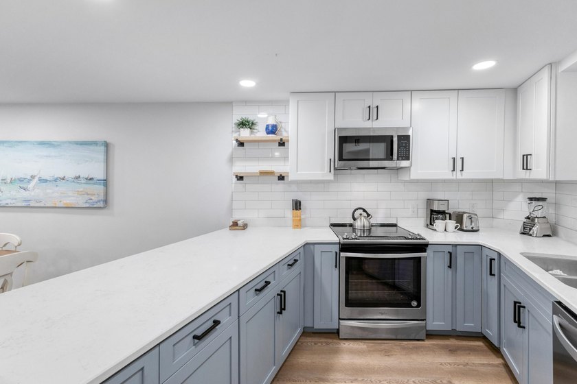 This beautifully appointed 2-bedroom, 2-bath condo is move-in or - photo 6