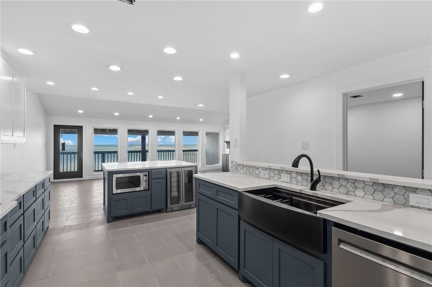 Welcome to luxury coastal living on iconic Ocean Drive, offering - photo 14