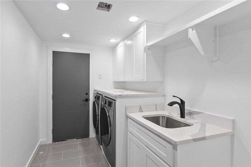 Welcome to luxury coastal living on iconic Ocean Drive, offering - photo 19