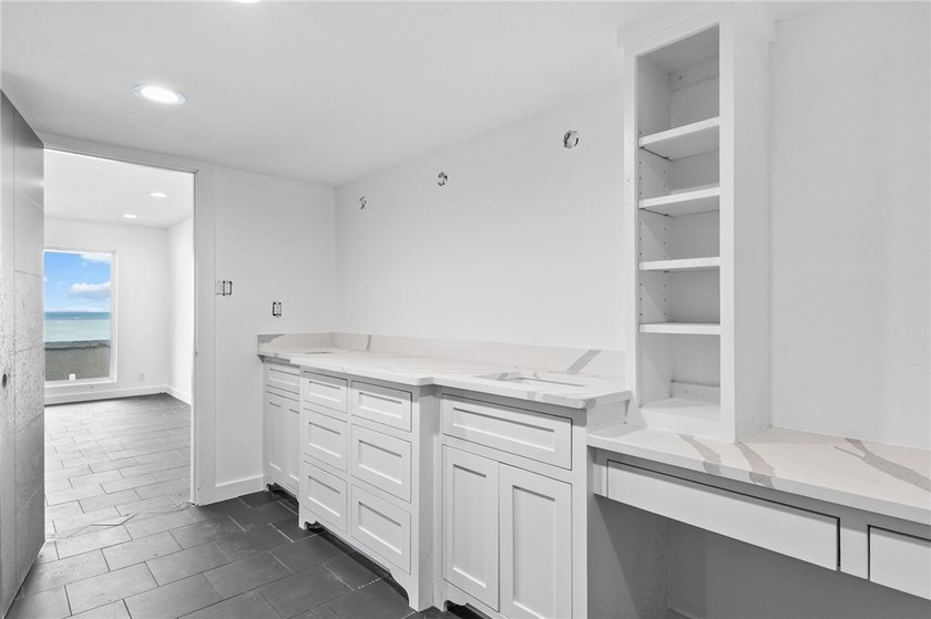 Welcome to luxury coastal living on iconic Ocean Drive, offering - photo 32