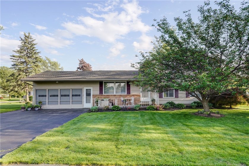 Welcome to this well-maintained split level home in Gates. Lots - photo 2