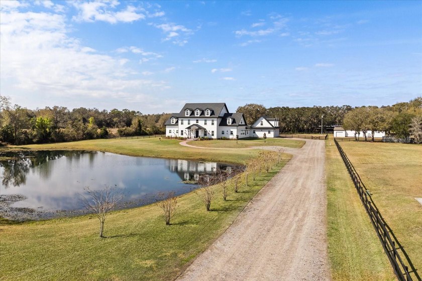 Three separate living quarters. Nearly five acres. Resort-style - photo 2
