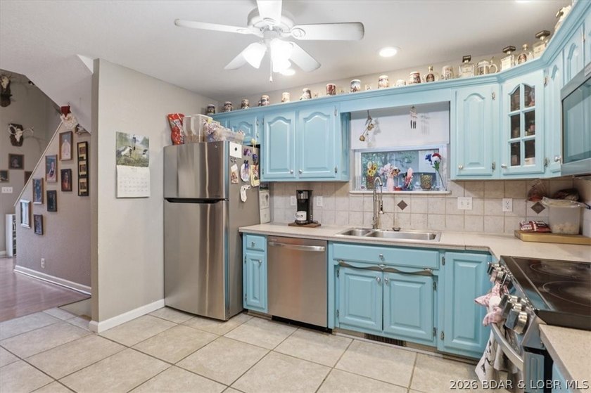 This stunning 4-bedroom, 3-bathroom lake home offers the perfect - photo 3