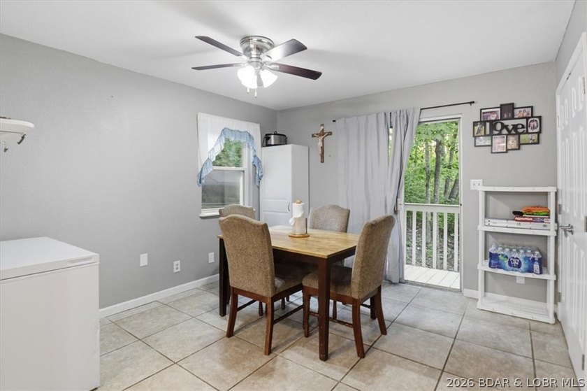 This stunning 4-bedroom, 3-bathroom lake home offers the perfect - photo 5