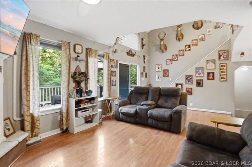 This stunning 4-bedroom, 3-bathroom lake home offers the perfect - photo 8