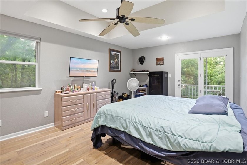 This stunning 4-bedroom, 3-bathroom lake home offers the perfect - photo 10