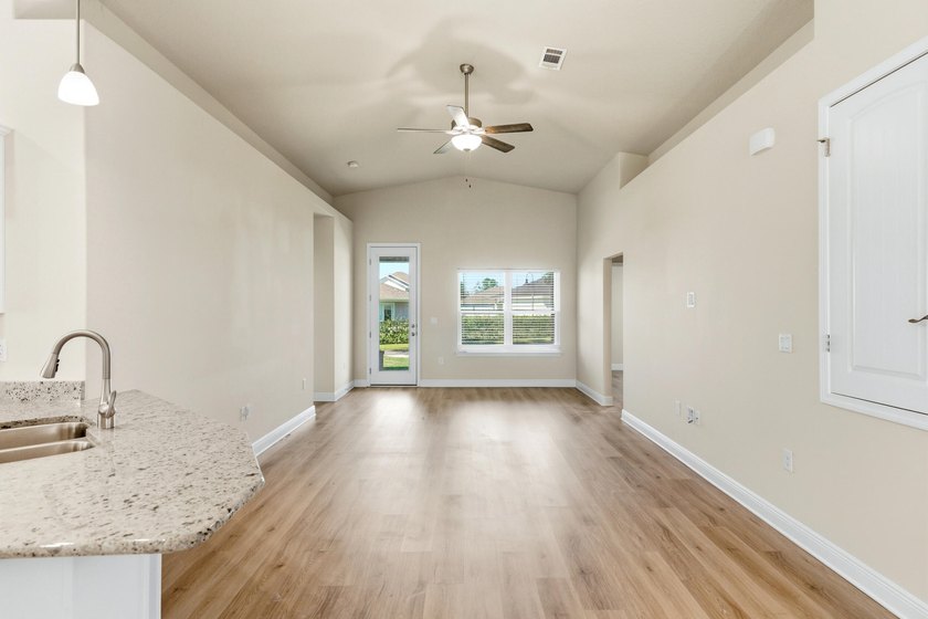 Why wait for new construction? This 2022-built home delivers the - photo 3