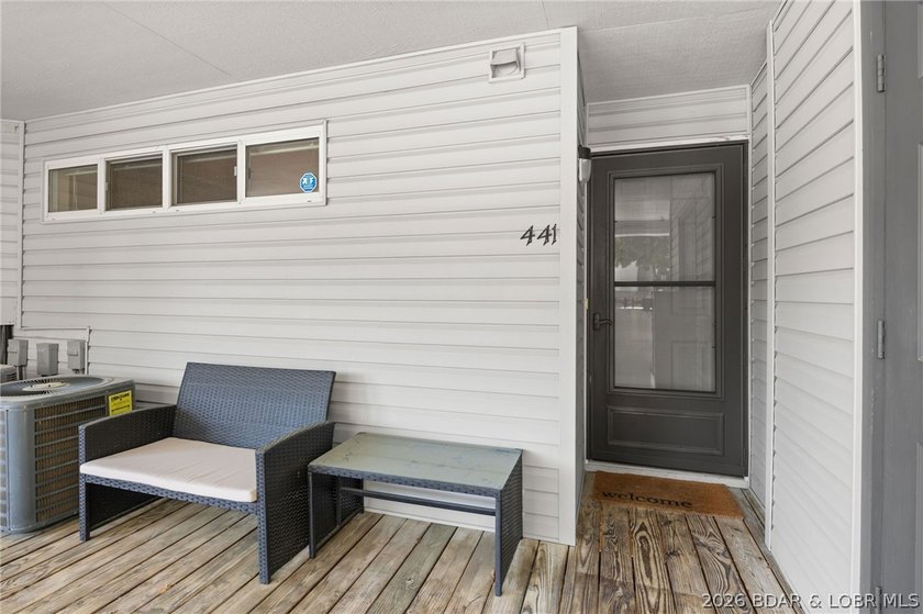 Experience the ultimate Lake of the Ozarks lifestyle in this - photo 4