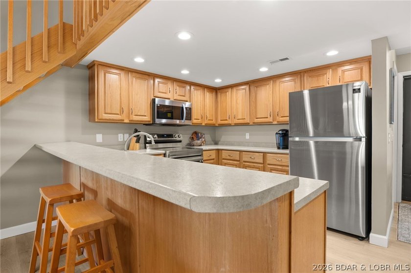 Experience the ultimate Lake of the Ozarks lifestyle in this - photo 8