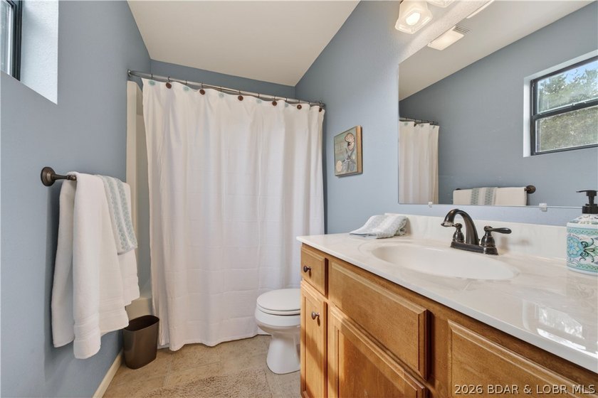 Discover the quieter side of the Lake of the Ozarks! Situated at - photo 9