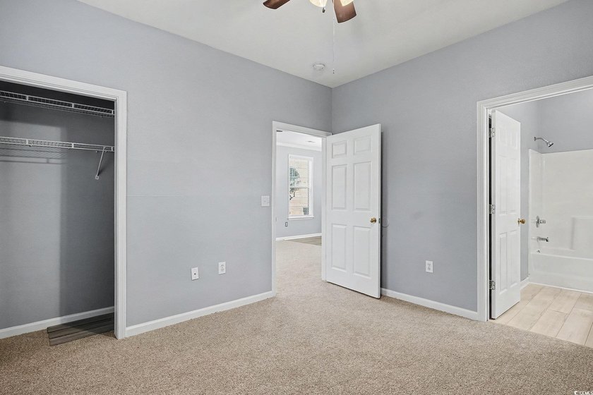 This welcoming 2-bedroom, 2-bath first-floor end-unit condo sits - photo 11