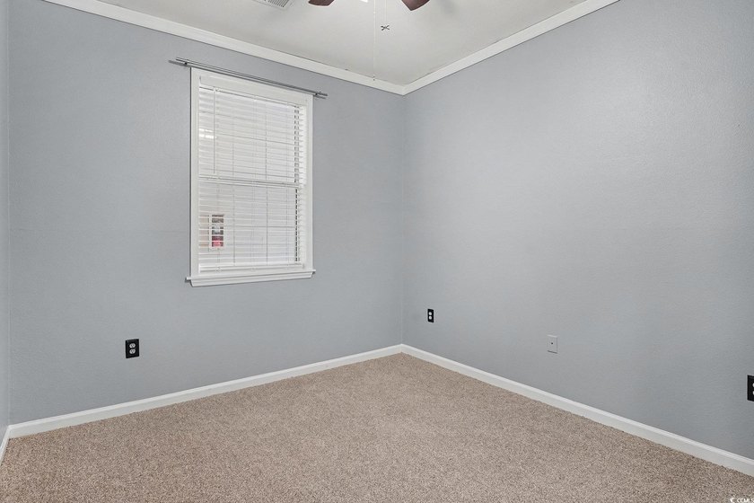 This welcoming 2-bedroom, 2-bath first-floor end-unit condo sits - photo 15