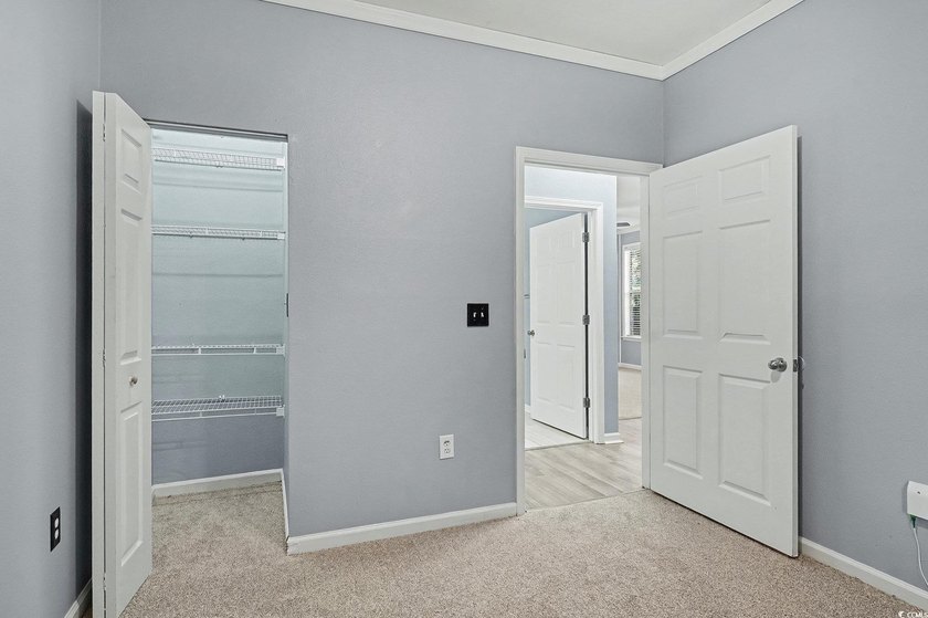 This welcoming 2-bedroom, 2-bath first-floor end-unit condo sits - photo 16