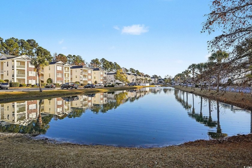This welcoming 2-bedroom, 2-bath first-floor end-unit condo sits - photo 23