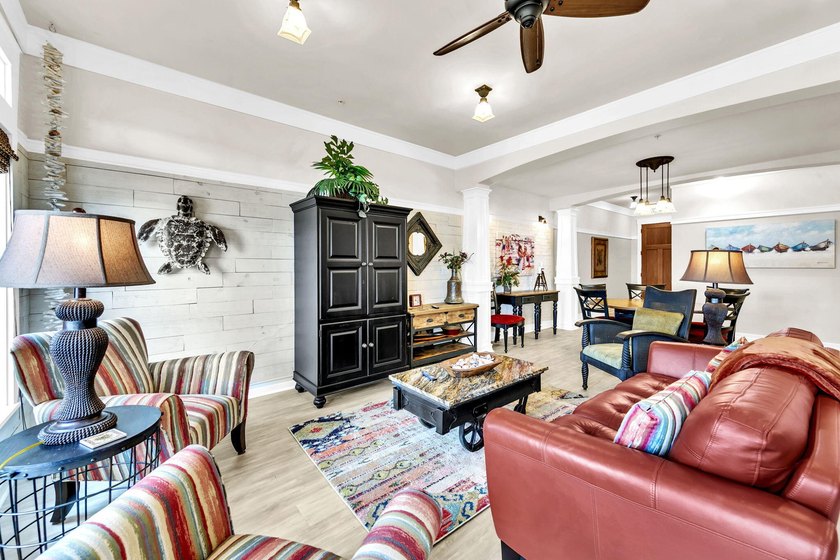 Welcome Home to your exquisite lakefront coastal oasis! Wild - photo 9