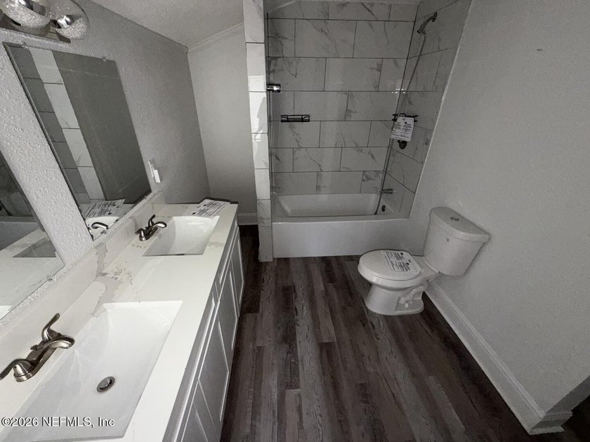 This previously renovated 3 bedroom, 2 bath home is in need of - photo 11