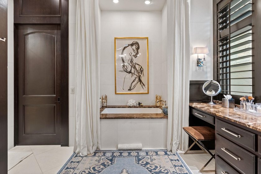 Nestled along the coveted waterfront on Lighthouse Drive in - photo 19